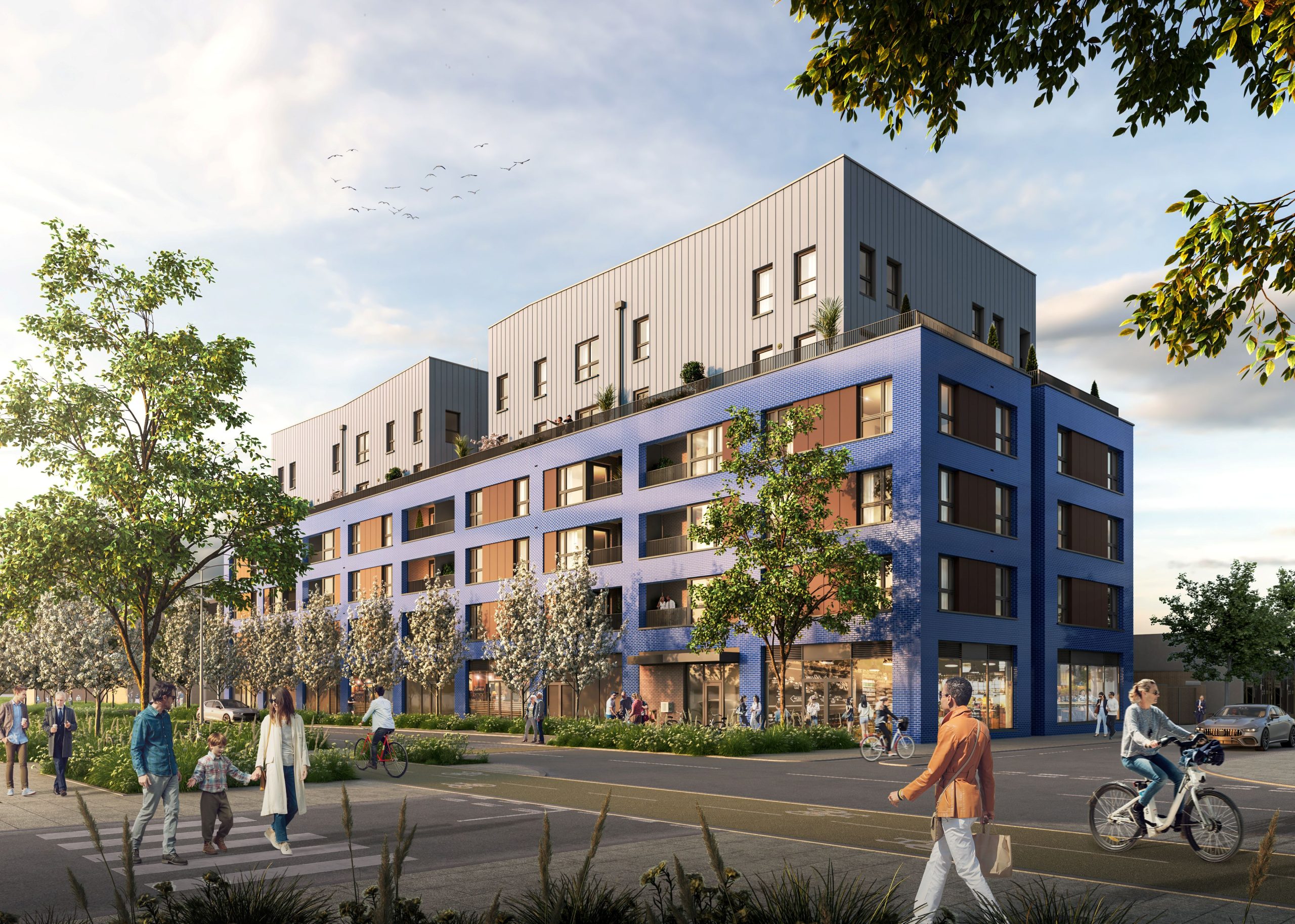CGI image of what the Hengrove Bookends development could look like. Blue brick apartment building, with grey clad fourth floor/ Wide pedestrian and cycle path runs next to it, with a tree lined boulevard.