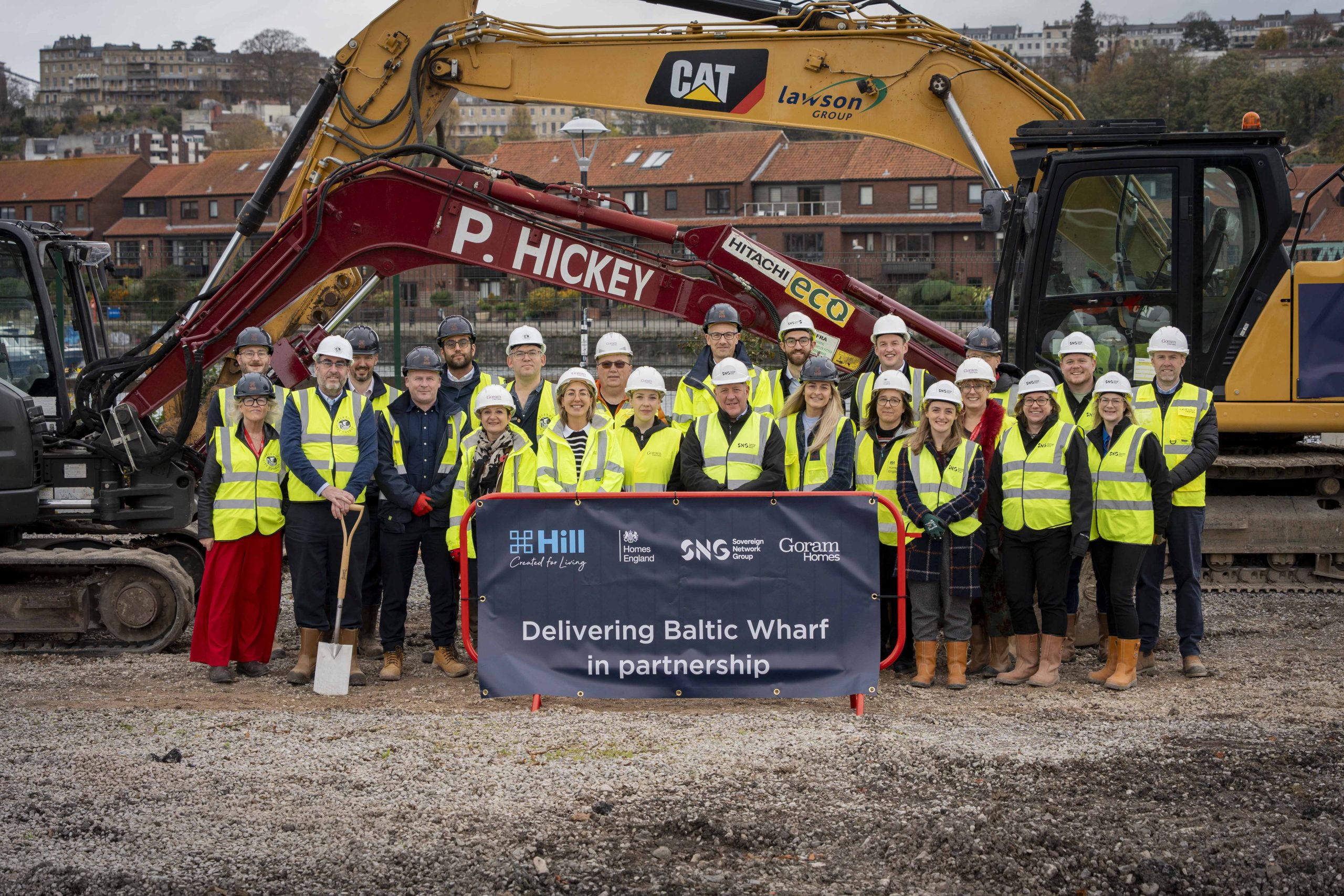 Cllr. Tony Dyer, Leader of Bristol City Council (third from left) alongside members of the Council's housing team and representatives of the core project delivery team for Baltic Wharf.